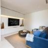 Noku Beach House Wide TV screen and Comfortable Couch